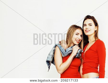 best friends teenage girls together having fun, posing emotional on white background, besties happy smiling, lifestyle people concept close up. making selfie
