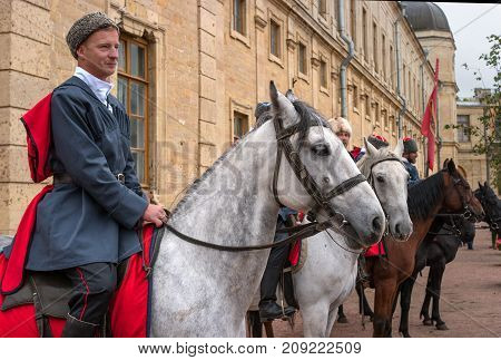 Gatchina St. Petersburg Russia - September 30 2017: Horse show of Cossacks on the parade ground of the Gatchina Palace. The construction of Cossacks on the parade ground of the Gatchina Palace.