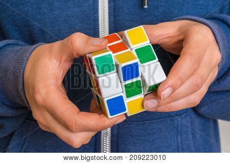 Rubik's Cube In Female Hands - Game For Solving Problems