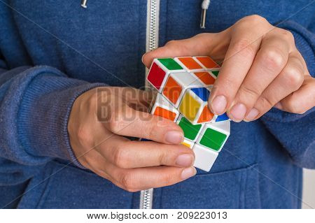 Rubik's Cube In Female Hands - Game For Solving Problems