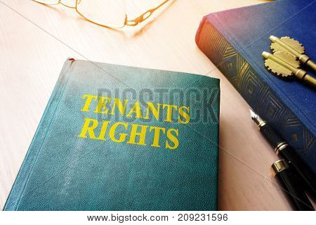 Tenants rights and keys from apartments on a desk.