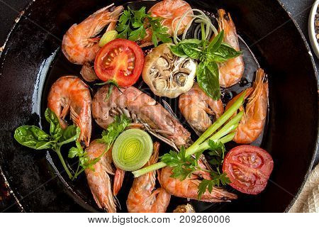 Bbq Grilled Shrimps On Fried Pan Serving With Cherry Tomato, Basil, Leek And Baked Garlic. Barbecue