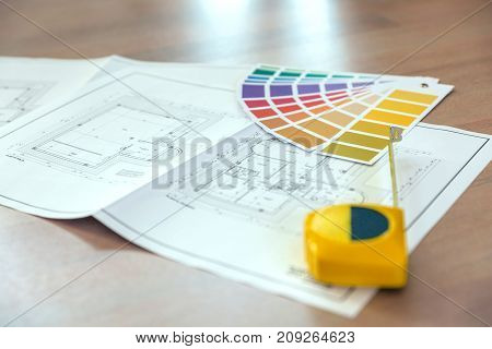 Detail of architecture plan, color palette and metre