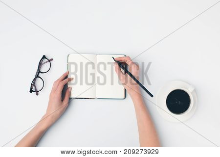 Writing In Notebok