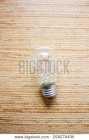 Turned off the light bulb on the floor like an idea that did not come