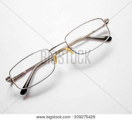 Glasses on a white background as a new idea