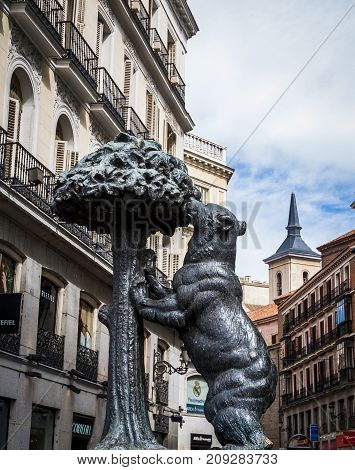 Madrid April 2009 Spain: symbol of Madrid statue of bear and strawberry tree puerta del sol Spain, The statue has a plate that says it is geographically located in the center of Spain