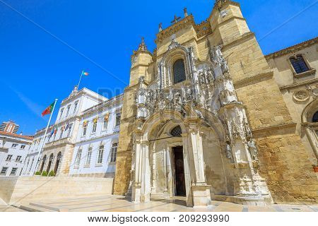Santa Cruz Monastery and Church and Town Hall of Coimbra in Praca 8 de Maio, sunny day with blue sky. Central Portugal, Europe.