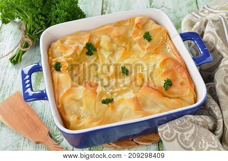 Cheese puff pie from unleavened dough. Georgian cuisine - khachapuri Achma