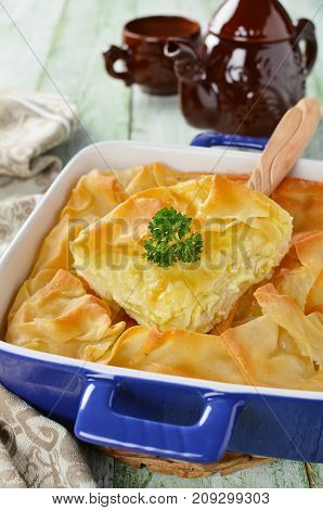 Cheese puff pie from unleavened dough. Georgian cuisine - khachapuri Achma
