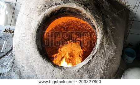 Baking the bread in tandoor at Manama Bahrain