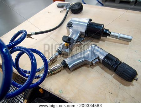 Voronezh, Russia - June 13, 2017: Pneumatic tool lies on the table