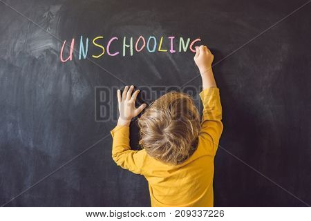 Concept Unschooling Home Learning Back To School Color Chalk On Black Blackboard Background In Row T