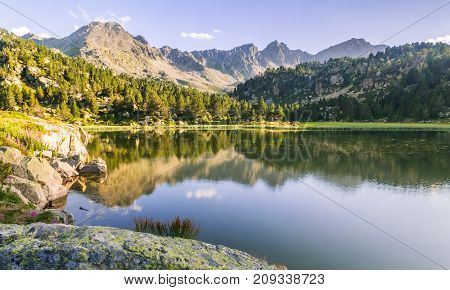 Estany Primer lake in Andorra Pyrenees Mountains.