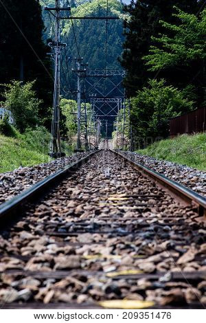 Railroad Vanishing Into The Distant Forests In Chichibu.