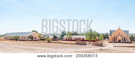 WITKRANS NAMIBIA - JULY 5 2017: Panorama of the Roman Catholic Church and school at Witkrans on the C15-road between Stampriet and Gochas in the Hardap Region in Namibia