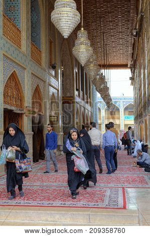 Fars Province Shiraz Iran - 19 april 2017: Shah Cheragh Shrine Iranian people visit the mosque at the prayer hour.