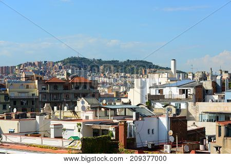 Barcelona historical buildings in Eixample District from the top of Casa  in Eixample District of Barcelona, Catalonia, Spain.