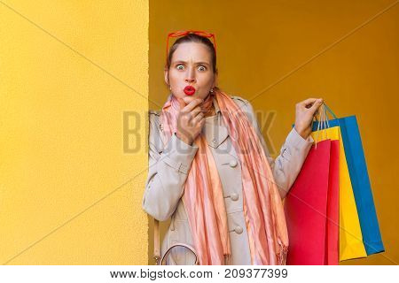 Three Beautiful Woman After Shopping. Looking At Camera With Shocked Face, And Wonder, Because Thay