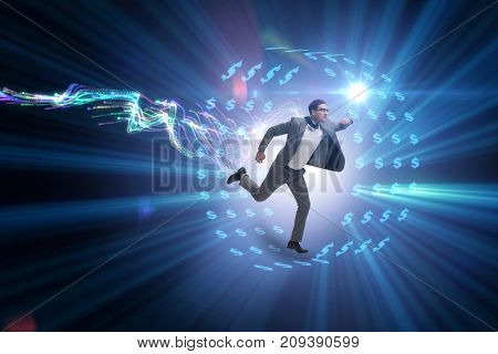 Businessman in hamster wheel chasing dollars