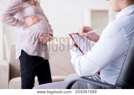 Pregnant woman visiting psychologist doctor