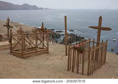 Pisagua, Tarapaca Region, Chile - August 30, 2017: Historic cemetery from the era of nitrate mining in the Atacama Desert, at Pisagua on the coast of northern Chile