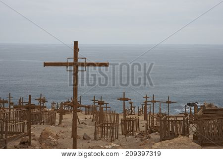 Pisagua, Tarapaca Region, Chile - August 30, 2017: Historic cemetery from the era of nitrate mining in the Atacama Desert, at Pisagua on the coast of northern Chile