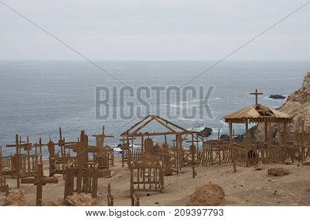 Pisagua, Tarapaca Region, Chile - August 30, 2017: Historic cemetery from the era of nitrate mining in the Atacama Desert, at Pisagua on the coast of northern Chile