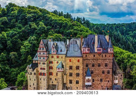 Eltz Castle in Rhineland-Palatinate, Germany. Beautiful landscape with medieval architecture.