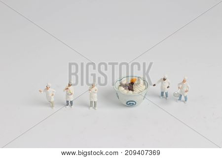 Tiny Of Cook Are Talking In The Kitchen.