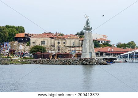 NESEBAR BULGARIA - AUGUST 21 2017: View of the old town the seaport and the monument to St. Nicholas. Nesebar is an ancient city and one of the major seaside resorts on the Bulgarian Black Sea Coast.