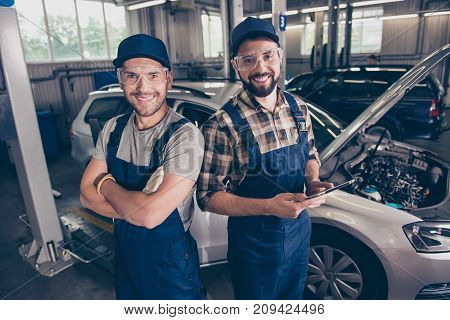 Automotive Breakdown, Wi Fi Internet Concept. Cheerful Experts At Work Shop, Standing In Blue Safety