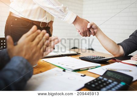 Co-workers are consultants on business documents tax transactions and business combinations after a bankrupt merger with a newly founded company.