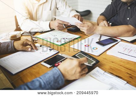 Co-workers are consultants on business documents tax transactions and business combinations after a bankrupt merger with a newly founded company.