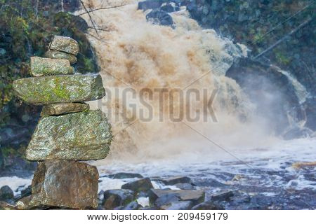 Falls in park in the Karelia, in clear summer day