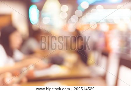 Blurred Background,people In Coffee Shop With Bokeh Light