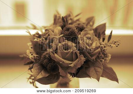 Flowers in the vase in monochrome color.