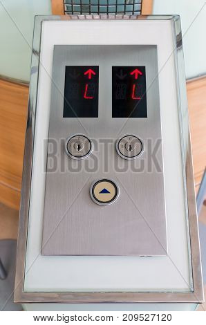 Elevator Button up direction with L for lobby floor