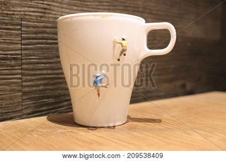 Fun Of Mini Tiny  People Climbing The Mug