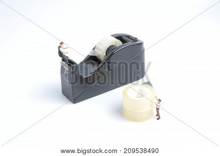 Mini Of Worker Replace The Tape For Dispenser