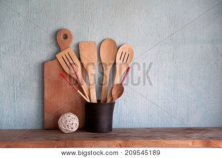 Kitchen Items On A Shelf Near The Wall