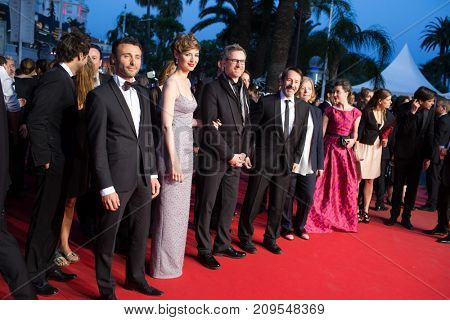 CANNES, FRANCE - MAY 20, 2015: L. Lariviere, L. Bourgoin, J.-H. Anglade  attend the 'Shan He Gu Ren' ('Mountains May Depart') premiere. 68th annual Cannes Film Festival at the Palais des Festivals 
