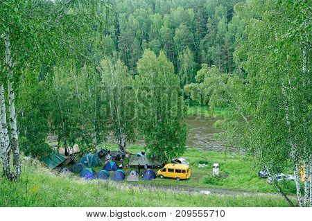 Beklenischevo, Russia - June 12, 2005: Group camps near Iset river. Sverdlovsk region