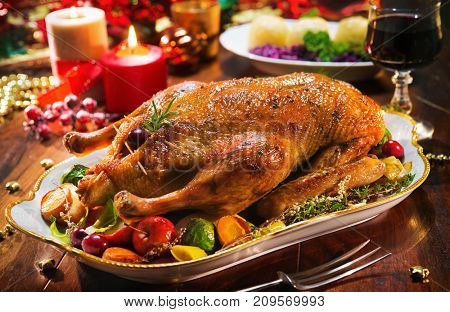 Roast Christmas duck with thyme and apples