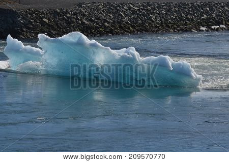 Beautiful Bluish Tint In A Iceburg In A Lagoon