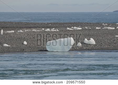 Glacier on the shore of Iceland with a stunning shin from the sunlight