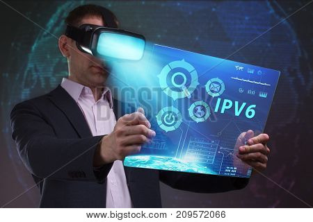 Business, Technology, Internet And Network Concept. Young Businessman Working In Virtual Reality Gla