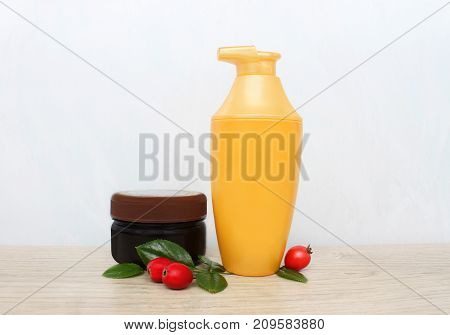 Two jars of cream and berries. daily care