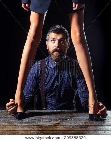 Businessman At Table With Female Legs.