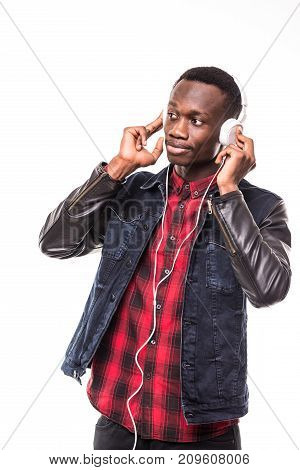 African American Man Listening Music In Headphones And Dancing Isolated On White